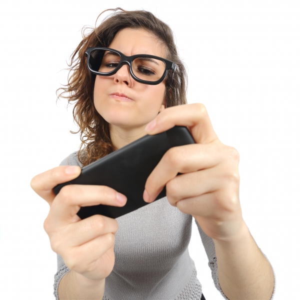 8984393-geek-woman-playing-with-a-smart-phone
